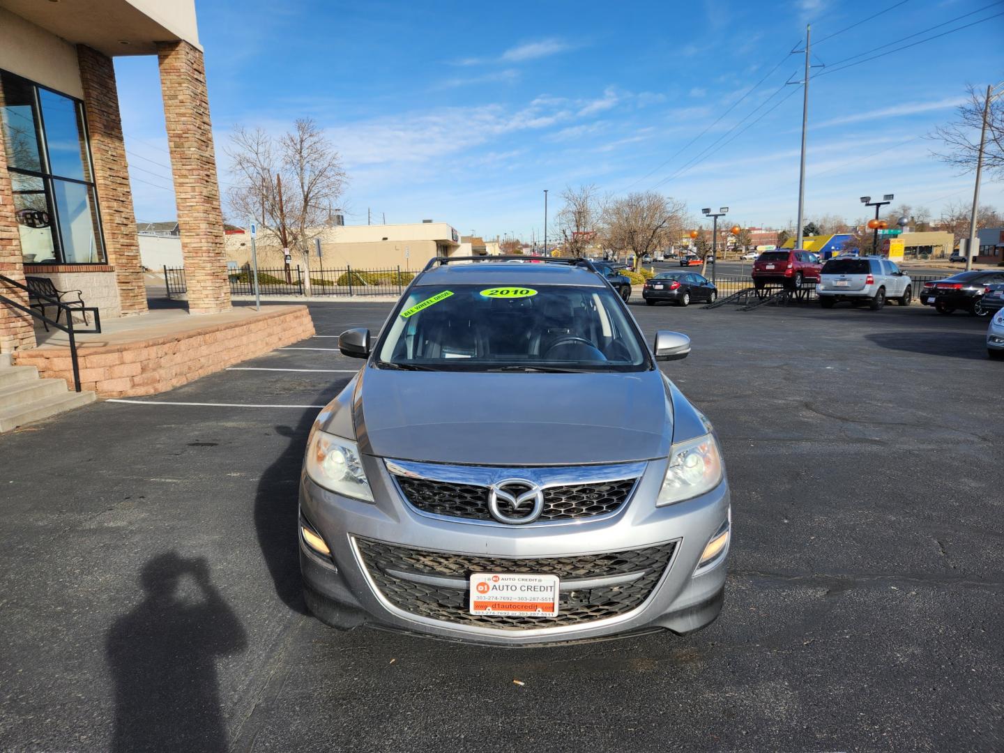 2010 Liquid Silver Metallic /Black Mazda CX-9 Grand Touring (JM3TB3MA6A0) with an 3.7L V6 DOHC 24V engine, Automatic transmission, located at 8595 Washington St., Thornton, CO, 80229, (303) 287-5511, 39.852348, -104.978447 - 2010 Mazda CX-9<br><br>D1 Auto NEVER charges dealer fees! All cars have clean titles and have been inspected for mechanical issues. We have financing for everyone. Good credit, bad credit, first time buyers.<br><br>Please call Lakewood Location 303-274-7692 or Thornton 303-287-5511 to schedule a tes - Photo#2